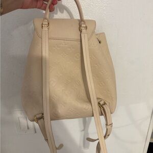 Louis Vuitton Cream Empreinte Leather Backpack